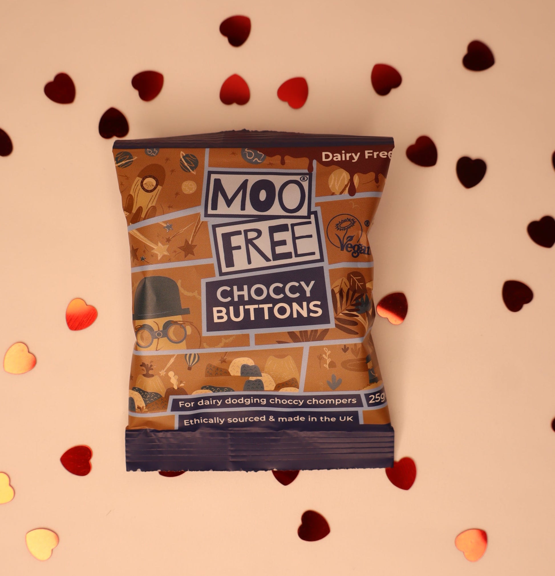 Pack of Moo Free Choccy Buttons on a white background with heart shapes
