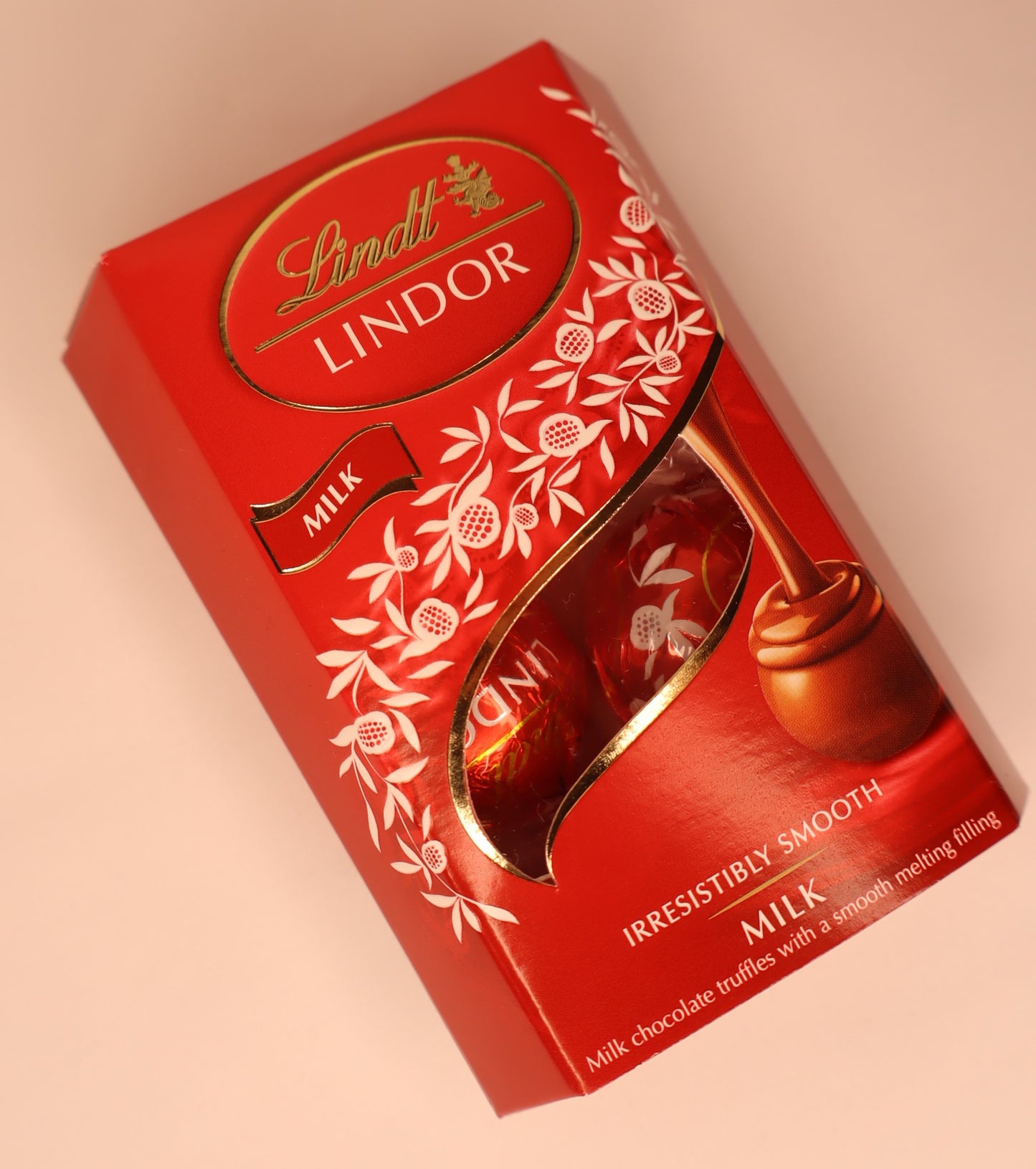 Lindt Lindor chocolate truffles packaging on a white background