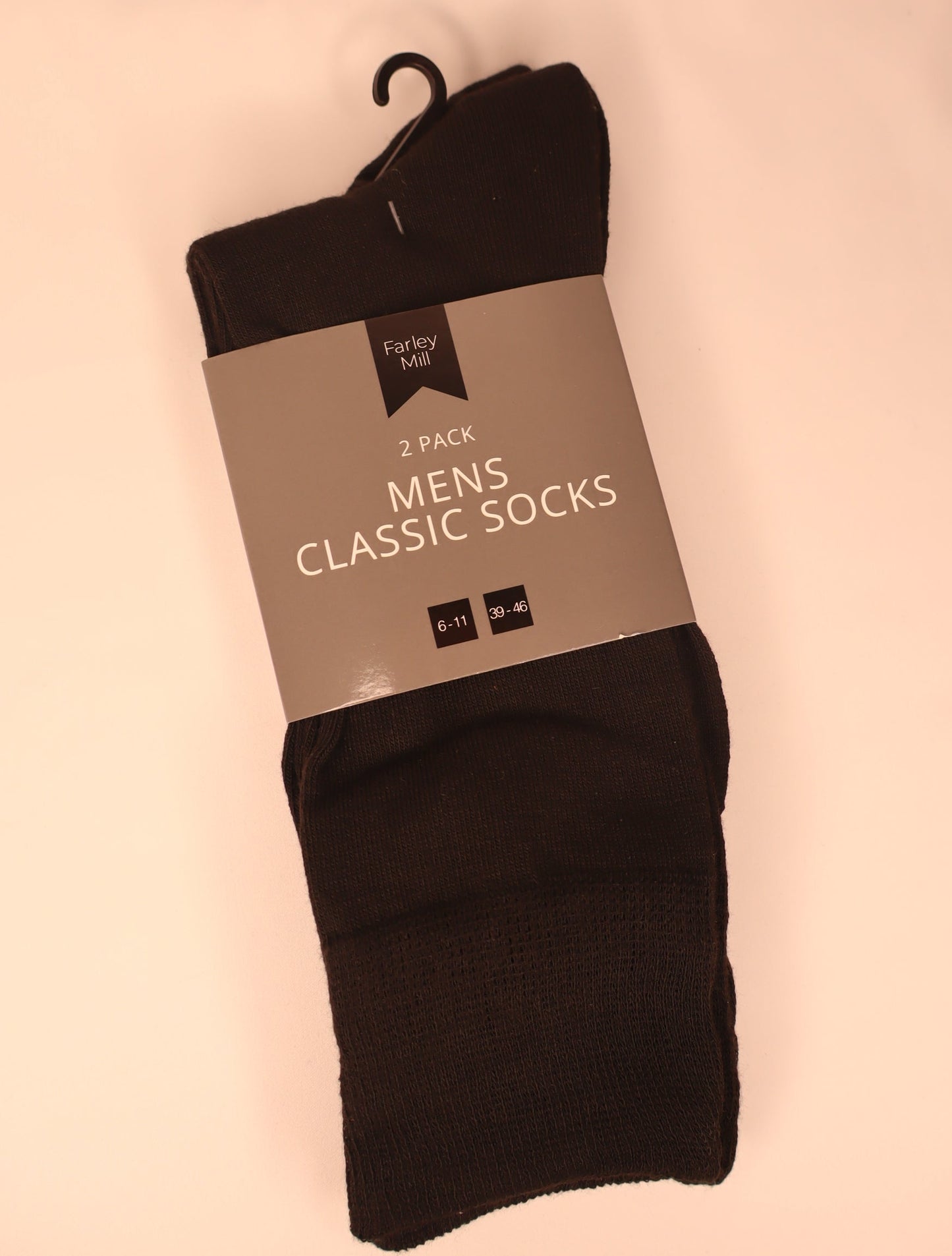 Pack of black men's classic socks on a white background